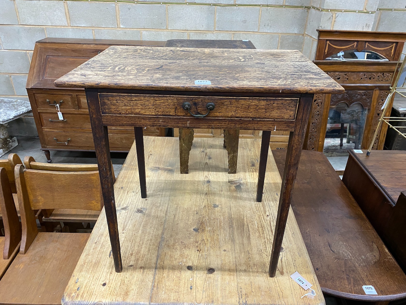 A 17th century style oak side table, width 72cm